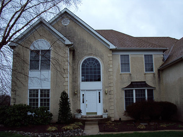 black stains on stucco