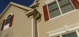 covering stucco with siding