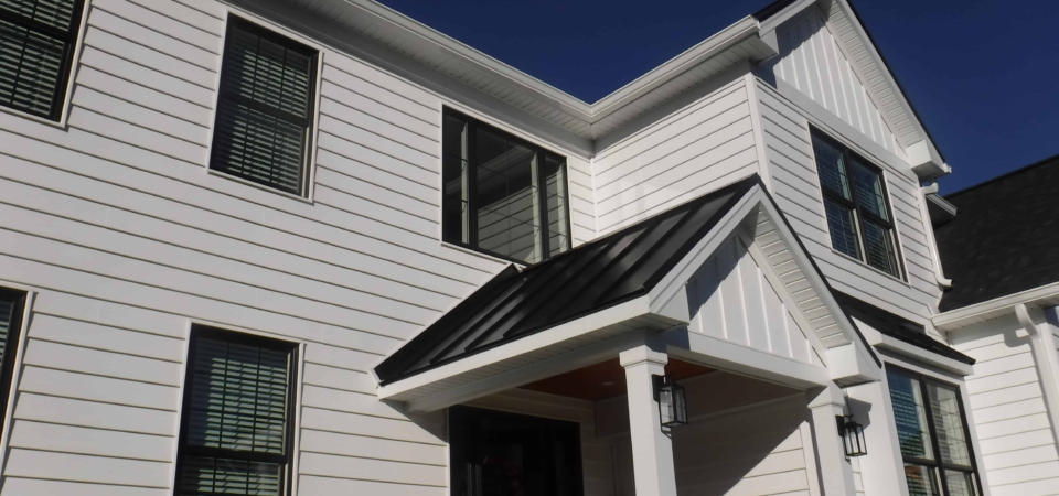 cost to replace stucco with vinyl siding